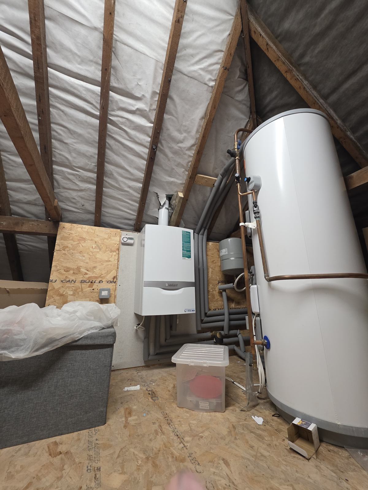 Boiler and unvented cylinder installed in a loft